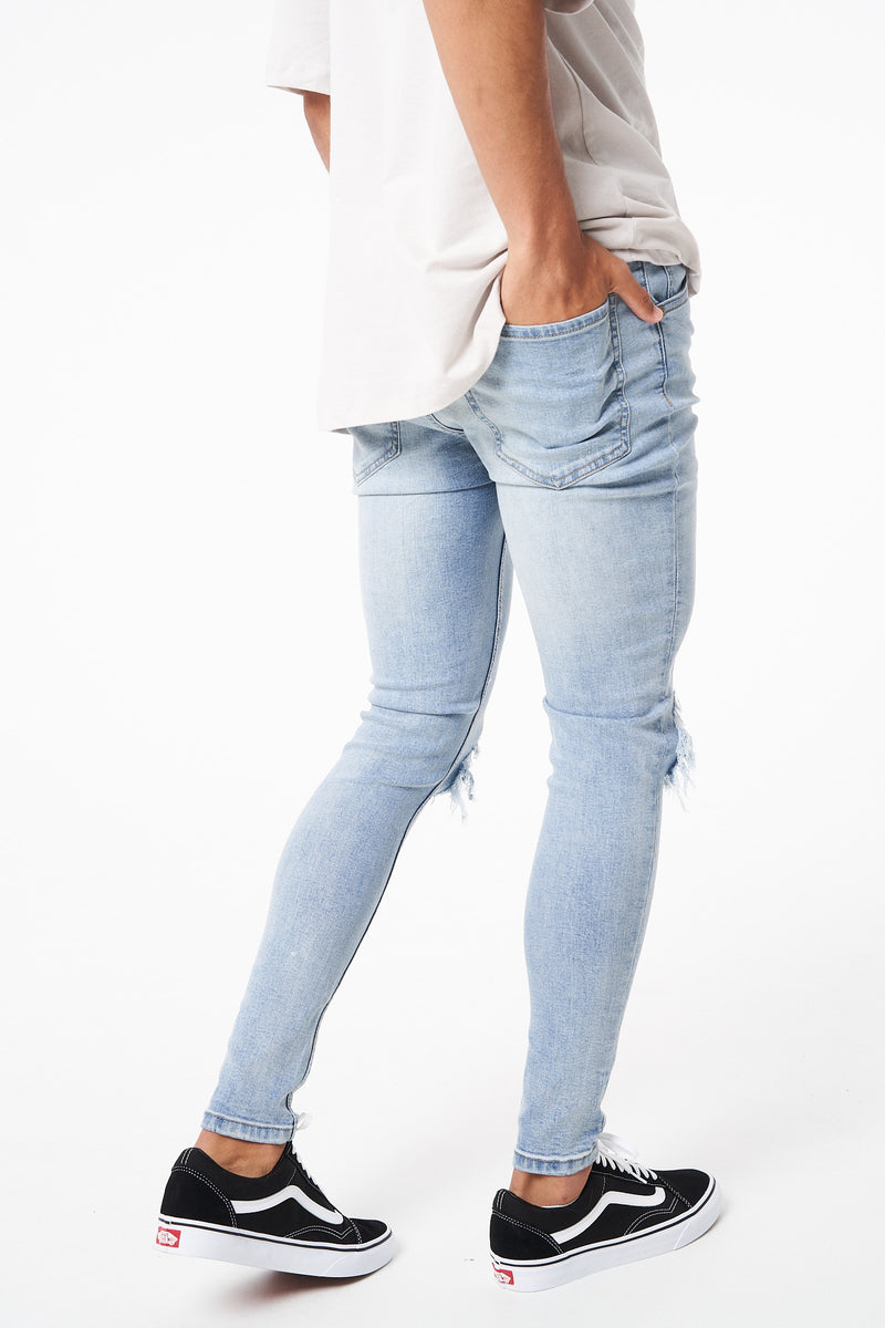 MADRID - RIPPED SKINNY STRETCH JEAN